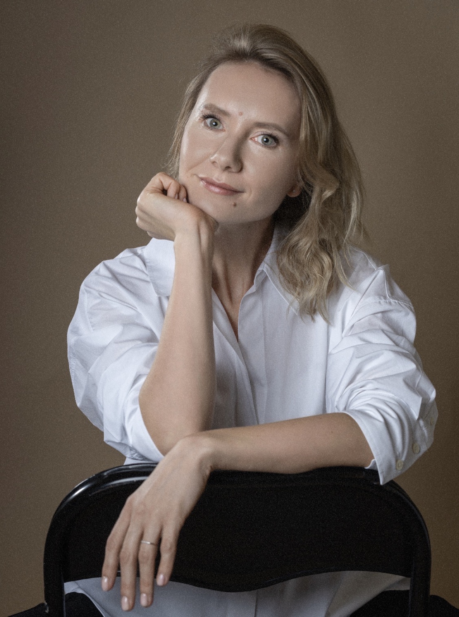 Portrait of Anastasia Kurkova in a white shirt